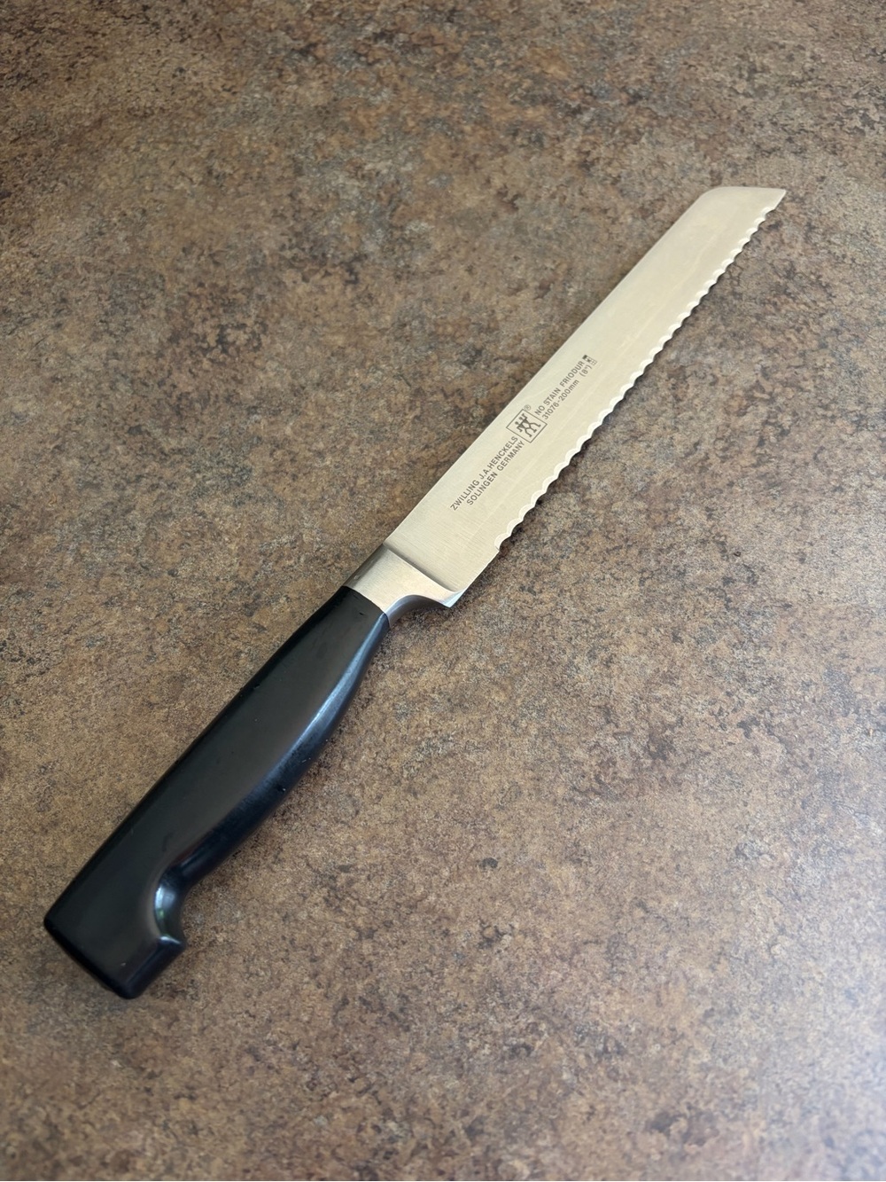 Zwilling J.A. Henckels Four Star 8” Serrated Bread Knife